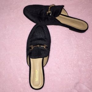 Francesca’s black velvet loafers